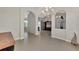 Bright room with arches, recessed lighting, ceiling fan and tile flooring throughout home at 29 Tournament Rd, Rotonda West, FL 33947
