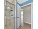 A tiled shower stall with glass doors inside a home's bathroom at 29 Tournament Rd, Rotonda West, FL 33947