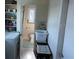 Laundry room featuring a washer and dryer with shelving at 4093 Pelican Shores Cir, Englewood, FL 34223