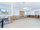 Living room with window view. Home interior is in need of repair from previous flooding damage at 4093 Pelican Shores Cir, Englewood, FL 34223