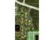 Community aerial view highlighting location of buildings, tennis court and pool at 4260 Placida Rd # 21C, Englewood, FL 34224