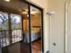 Bedroom featuring sliding glass doors to the lanai at 4260 Placida Rd # 21C, Englewood, FL 34224
