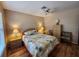 The primary bedroom is well-lit and has a large closet and comfortable seating at 4260 Placida Rd # 21C, Englewood, FL 34224