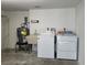 The laundry area includes a washing machine, dryer, and utility sink for added convenience at 4260 Placida Rd # 21C, Englewood, FL 34224