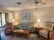 Cozy living room with comfortable seating and natural lighting at 4260 Placida Rd # 21C, Englewood, FL 34224