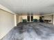 Covered parking with storage and multiple doors for easy access to storage at 4260 Placida Rd # 21C, Englewood, FL 34224