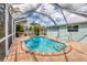 Stunning screened-in pool and patio with ample space for entertaining and relaxation at 5250 Callaway St, Port Charlotte, FL 33981