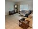 Cozy living room with comfortable seating and lots of natural light at 5473 Hoffman St, Port Charlotte, FL 33981