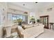 Comfortable living room offers tile floors and great views of the screened lanai at 585 Coral Creek Dr, Placida, FL 33946
