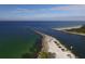 Aerial view of Venice Beach Inlet, with car parking, beaches, and stunning ocean views at 5879 Venisota Rd, Venice, FL 34293
