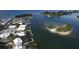 Panoramic aerial view of houses along the inlet, boasting dock access and amazing water views at 5879 Venisota Rd, Venice, FL 34293