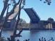 Casey Key Bridge with water view and lush landscaping, a beautiful sight at 5879 Venisota Rd, Venice, FL 34293