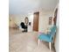 Bright home office featuring neutral walls, modern lighting, and a spacious desk area for remote work at 5879 Venisota Rd, Venice, FL 34293