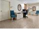 Inviting home office space with tiled flooring, neutral walls, and ample workspace for productivity at 5879 Venisota Rd, Venice, FL 34293