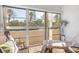 Bright sunroom with large windows overlooking the community at 708 Tamiami S Trl # 216, Venice, FL 34285