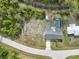 Cozy home featuring an attached garage, a spacious driveway, and a well-kept lawn for comfortable living at 7180 Quarry St, Englewood, FL 34224