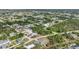A bird's-eye view shows the property's location within a quiet residential neighborhood, offering a glimpse of local living at 7180 Quarry St, Englewood, FL 34224