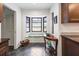 Bright kitchen nook featuring a window seat and plenty of natural light at 7180 Quarry St, Englewood, FL 34224