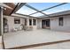 Outdoor patio with sun protection and outdoor seating at 7180 Quarry St, Englewood, FL 34224