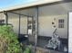 Cozy screened-in porch featuring comfortable seating, perfect for relaxing and enjoying outdoor views at 786 Heathercreek Ct, Englewood, FL 34223