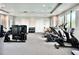 Well-equipped community gym with treadmills, weights, and exercise machines at 8244 Shore Lake Dr, Englewood, FL 34224