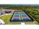 Community pickle ball courts for active residents at 8244 Shore Lake Dr, Englewood, FL 34224