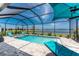 A refreshing screened-in pool with stunning lake views, perfect for relaxation and outdoor enjoyment at 8244 Shore Lake Dr, Englewood, FL 34224