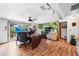 Home office space with hardwood floors, garden wall, and lots of natural light at 857 Palmetto St, Englewood, FL 34223