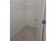 Walk-in closet featuring wire shelving at 8661 Seasalt Loop, Englewood, FL 34224