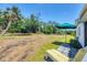 Lush backyard offers a serene escape for relaxation and outdoor enjoyment at 868 Harvard St, Englewood, FL 34223