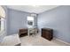 Bedroom with bright natural light, a ceiling light and mini-split A/C offers a quiet space at 868 Harvard St, Englewood, FL 34223