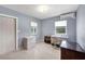 Bedroom with bright natural light, a ceiling light and mini-split A/C offers a quiet space at 868 Harvard St, Englewood, FL 34223