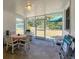 Screened patio with outdoor seating, perfect for enjoying the Florida weather at 868 Harvard St, Englewood, FL 34223