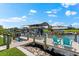 A private boat dock with a covered lift and canal access at 9470 Wacker Ter, Port Charlotte, FL 33981