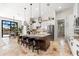 Spacious kitchen island with bar stool seating, granite counters, stainless appliances and ample storage at 9470 Wacker Ter, Port Charlotte, FL 33981