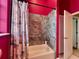 Cozy bathroom featuring a shower/tub combo and a shower curtain at 9594 Doubloon Trl, Placida, FL 33946