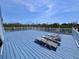 Spacious deck with lounge chairs, offering the perfect outdoor retreat to relax and soak up the sun at 9594 Doubloon Trl, Placida, FL 33946