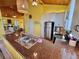 Bright kitchen with granite counters, stainless steel appliances and wood ceiling at 9594 Doubloon Trl, Placida, FL 33946