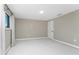 A neutral bedroom with two windows and neutral walls provides a soothing atmosphere at 11 Oakland Hills Rd, Rotonda West, FL 33947