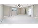 Spacious bedroom with a ceiling fan and natural light at 11 Oakland Hills Rd, Rotonda West, FL 33947