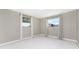 Bedroom with natural light from two windows at 11 Oakland Hills Rd, Rotonda West, FL 33947