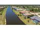 Waterfront single-Gathering home and canal in tropical setting with beautiful blue skies at 1157 Rotonda Cir, Rotonda West, FL 33947