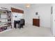 Bedroom features a white ceiling fan, a bookshelf, and a dark wooden dresser at 1157 Rotonda Cir, Rotonda West, FL 33947