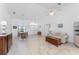 Bright living area with tile floors, ceiling fan and natural light at 1157 Rotonda Cir, Rotonda West, FL 33947
