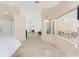 Open living space with tile floors and lots of natural light at 1157 Rotonda Cir, Rotonda West, FL 33947