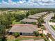 Aerial view of the property showing layout, landscaping, and proximity to surrounding area at 13392 Abercrombie Dr, Englewood, FL 34223