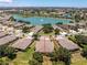 Desirable single Gathering home overlooking a serene lake with a fountain in a sought-after community at 13392 Abercrombie Dr, Englewood, FL 34223