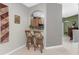 View of the kitchen bar area with seating at 13392 Abercrombie Dr, Englewood, FL 34223