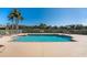 Community pool offers clear, cool water and plenty of deck space for residents to enjoy under sunny skies at 13392 Abercrombie Dr, Englewood, FL 34223