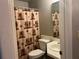 Bathroom with a decorative shower curtain at 13561 Darnell Ave, Port Charlotte, FL 33981